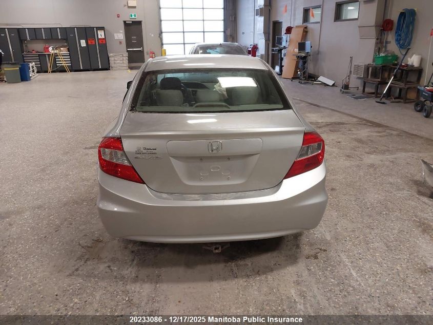 2012 Honda Civic Lx VIN: 2HGFB2F47CH060630 Lot: 20233086