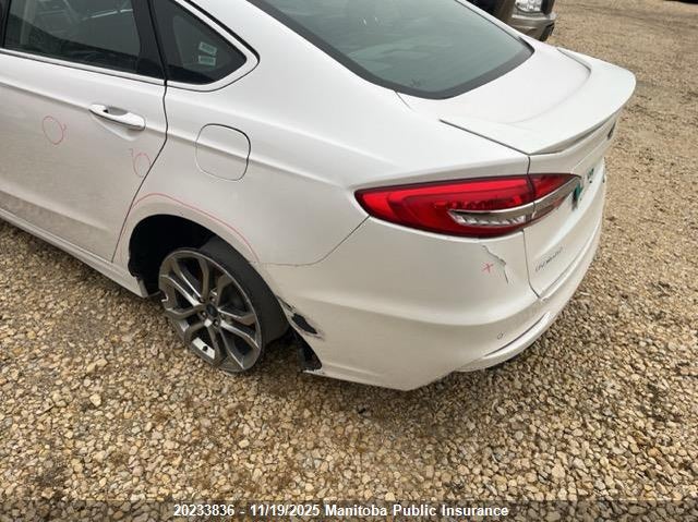 2019 Ford Fusion Hybrid Titanium VIN: 3FA6P0RU7KR244099 Lot: 20233836