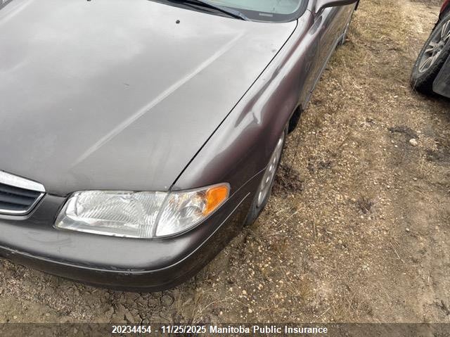 2001 Mazda 626 Lx VIN: 1YVGF22C115202392 Lot: 20234454