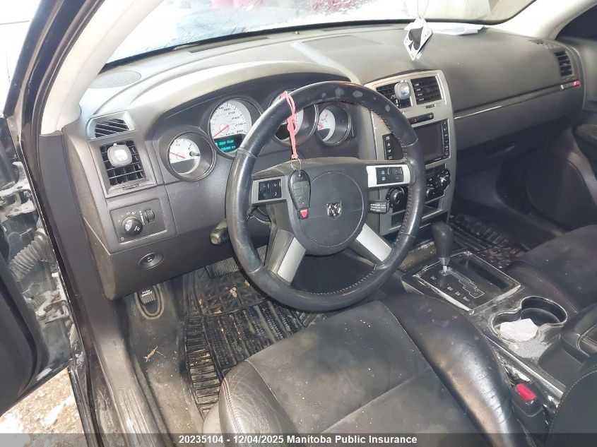 2008 Dodge Charger Srt8 VIN: 2B3LA73W78H154281 Lot: 20235104