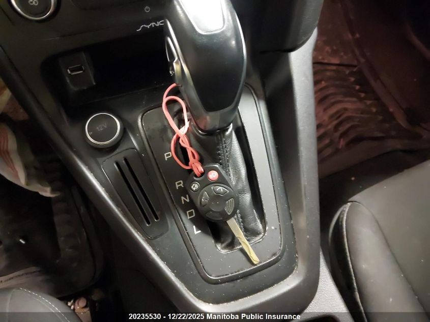 2015 Ford Focus Se VIN: 1FADP3F21FL272450 Lot: 20235530