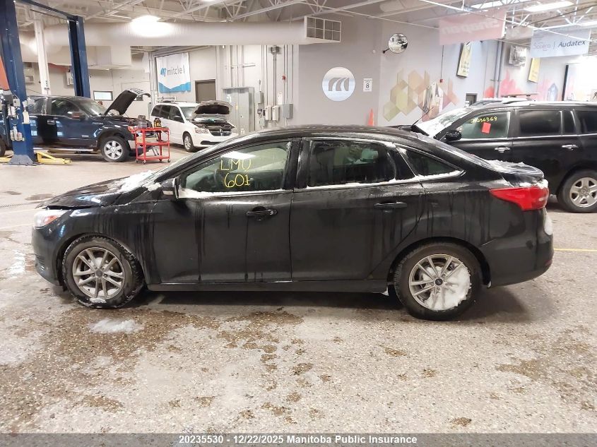 2015 Ford Focus Se VIN: 1FADP3F21FL272450 Lot: 20235530