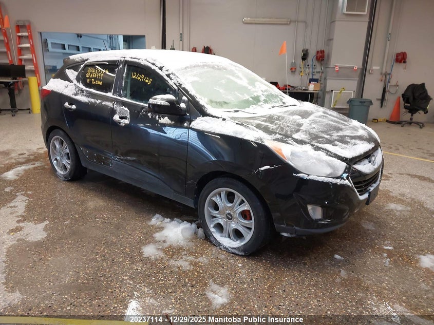 KM8JUCAC9DU656999 2013 Hyundai Tucson Limited auction photo 1