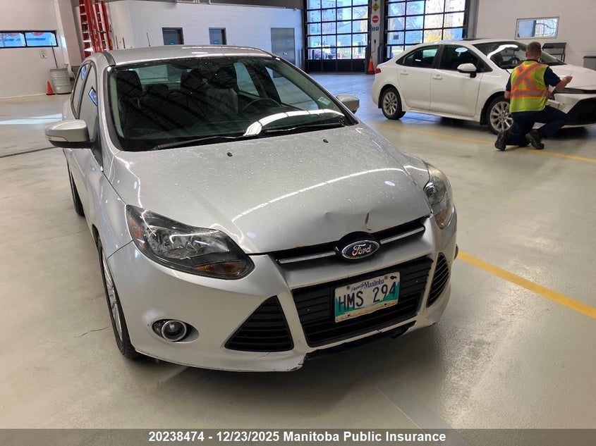 1FAHP3J25CL121471 2012 Ford Focus Titanium auction photo 1