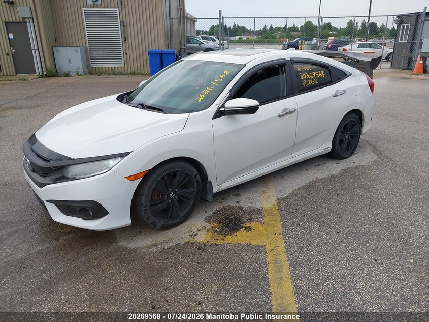 2016 Honda Civic, Заднее стекло, IAAI, VIN 2HGFC1F92GH100606 — фото 2