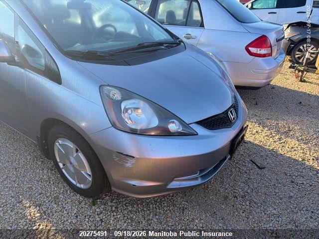 2009 Honda Fit, Град, IAAI, VIN JHMGE87559S813169 — фото 2