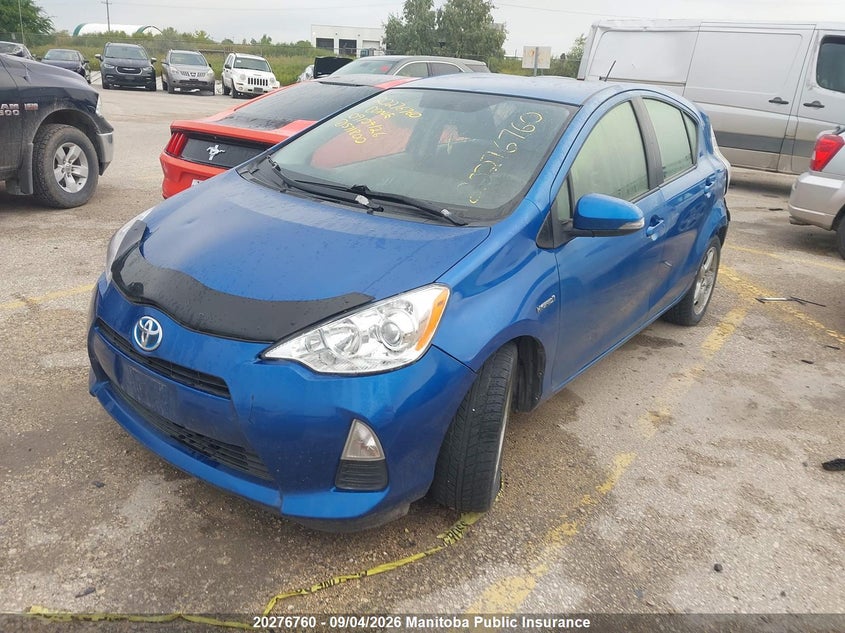 2014 Toyota Prius C, Hail, IAAI, VIN JTDKDTB33E1571800 — photo 2