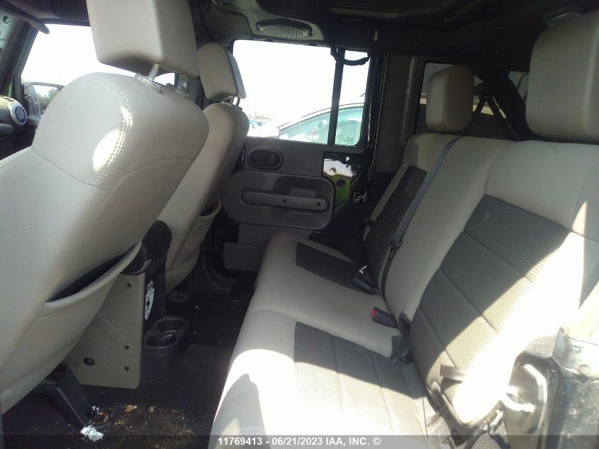 2010 Jeep Wrangler Unlimited Sahara VIN: 1J4BA5H13AL220727 Lot: 11769413