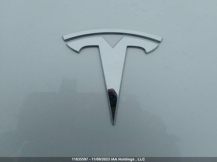 2021 Tesla Model 3 Standard Range VIN: 5YJ3E1EA1MF026040 Lot: 11835597