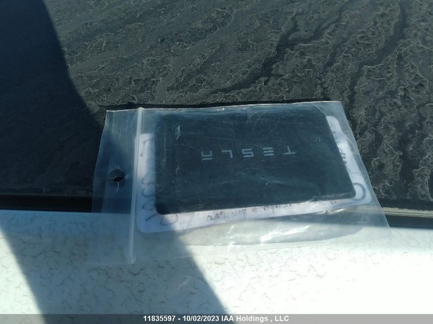 2021 Tesla Model 3 Standard Range VIN: 5YJ3E1EA1MF026040 Lot: 11835597