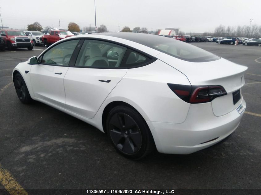 2021 Tesla Model 3 Standard Range VIN: 5YJ3E1EA1MF026040 Lot: 11835597