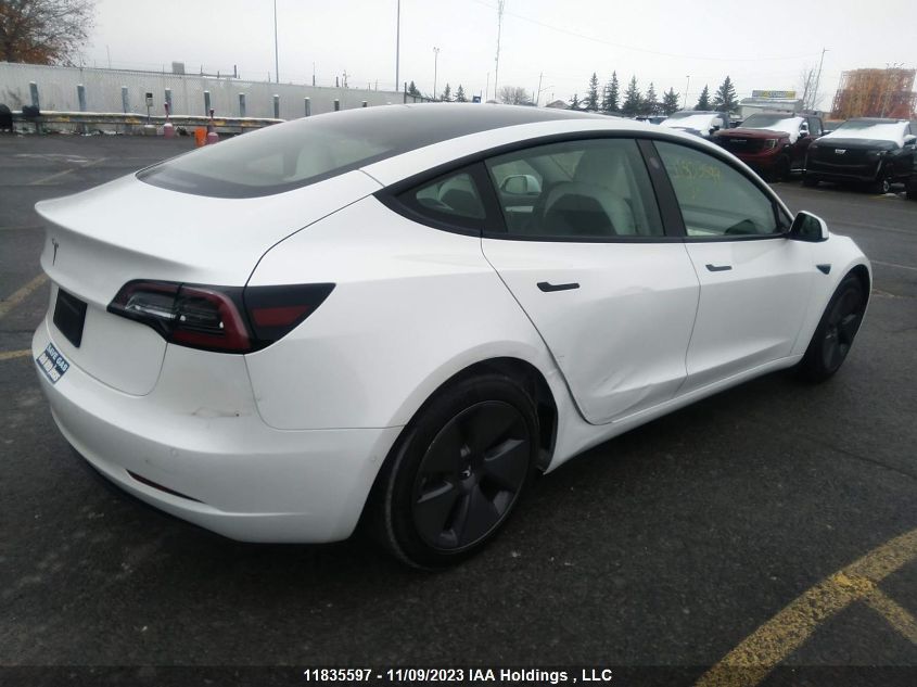 2021 Tesla Model 3 Standard Range VIN: 5YJ3E1EA1MF026040 Lot: 11835597