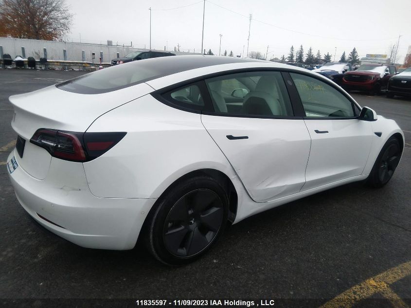 2021 Tesla Model 3 Standard Range VIN: 5YJ3E1EA1MF026040 Lot: 11835597