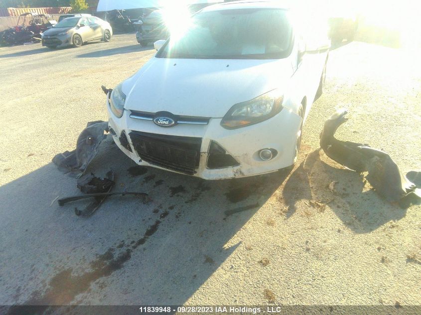 2013 Ford Focus Titanium VIN: 1FADP3N29DL355803 Lot: 11839948