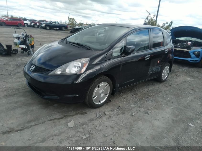 2009 Honda Fit Lx VIN: JHMGE87589S810427 Lot: 11847609