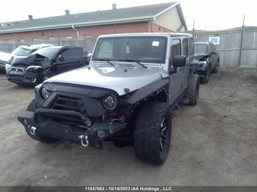 2015 Jeep Wrangler Unlimited Sahara VIN: 1C4BJWEG0FL516977 Lot: 11847663