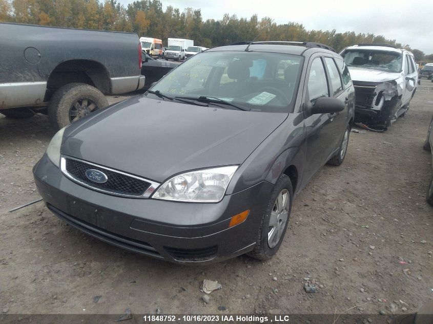 2007 Ford Focus Se/Ses VIN: 1FAFP36N97W189318 Lot: 11848752