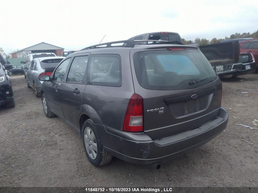 2007 Ford Focus Se/Ses VIN: 1FAFP36N97W189318 Lot: 11848752