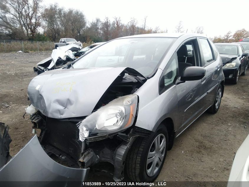 2009 Honda Fit Dx-A VIN: JHMGE87359S809217 Lot: 11853989