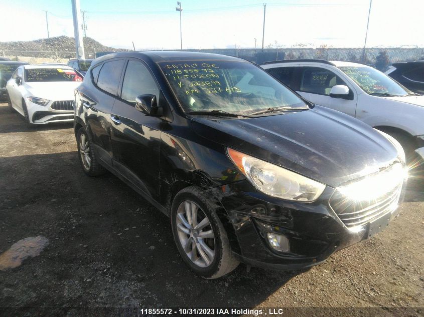 2011 Hyundai Tucson VIN: KM8JUCAC9BU222899 Lot: 11855572