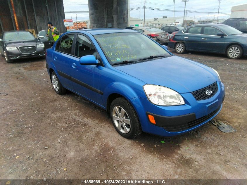 2009 Kia Rio Ex VIN: KNADE223696542636 Lot: 11858989