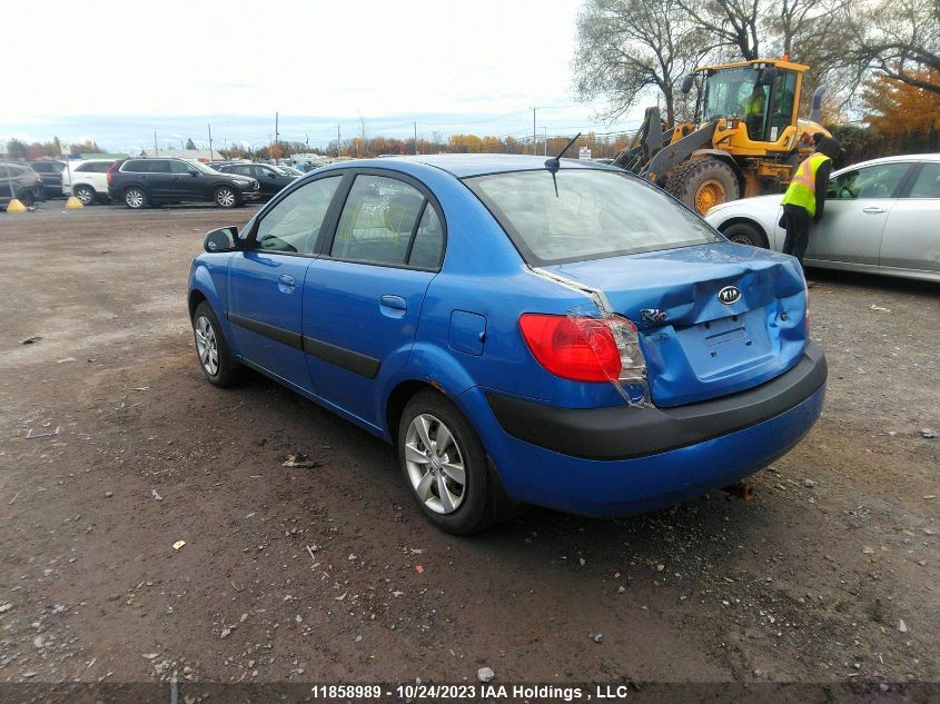 2009 Kia Rio Ex VIN: KNADE223696542636 Lot: 11858989