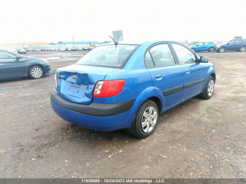 2009 Kia Rio Ex VIN: KNADE223696542636 Lot: 11858989