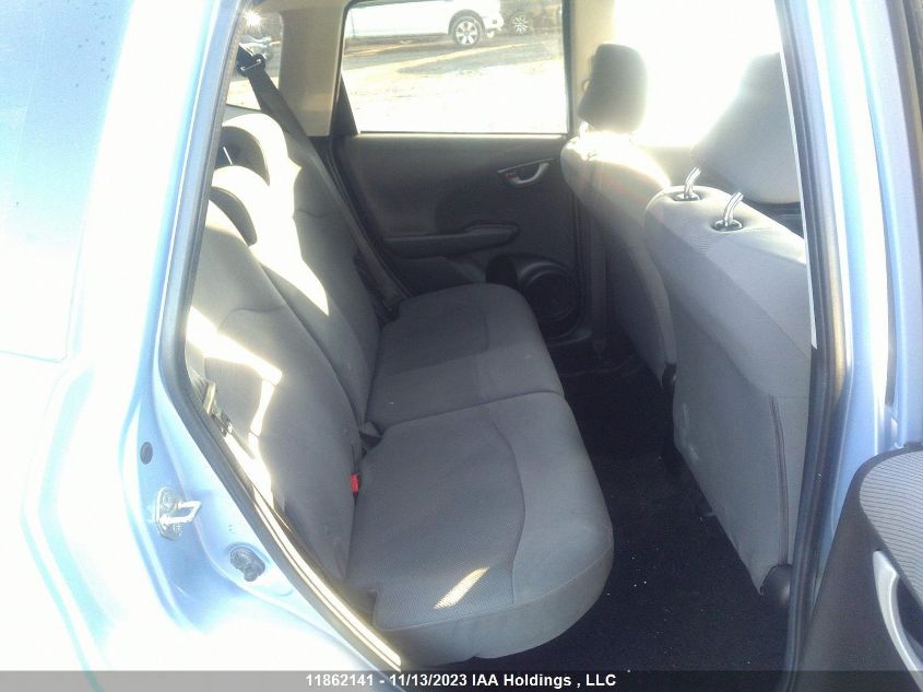 2009 Honda Fit Lx VIN: JHMGE87549S809517 Lot: 11862141