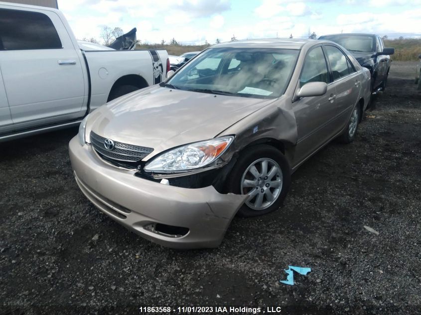 2004 Toyota Camry Le/Xle VIN: 4T1BF30K14U579438 Lot: 11863568