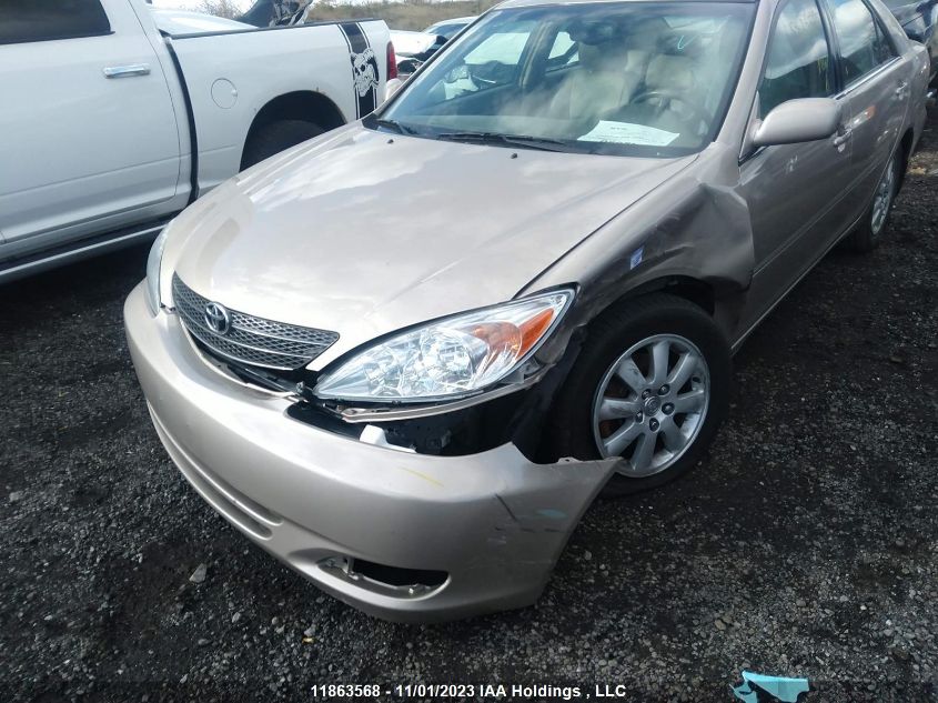 2004 Toyota Camry Le/Xle VIN: 4T1BF30K14U579438 Lot: 11863568