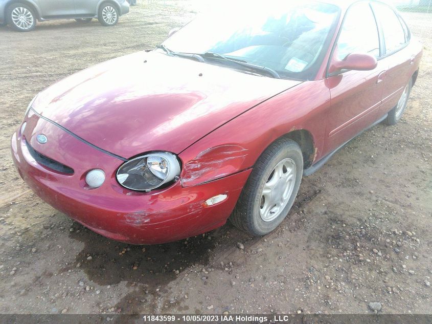 1997 Ford Taurus Gl VIN: 1FALP52UXVG304737 Lot: 11843599X