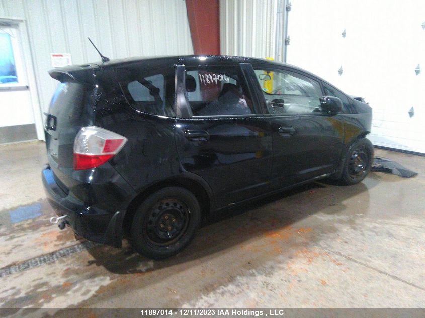 2009 Honda Fit Lx VIN: JHMGE88599S810158 Lot: 11897014