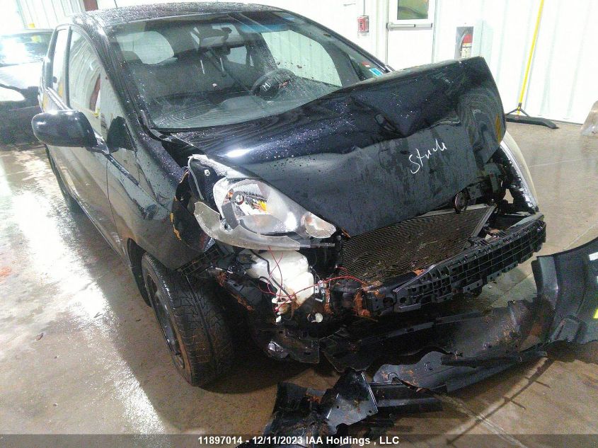 2009 Honda Fit Lx VIN: JHMGE88599S810158 Lot: 11897014