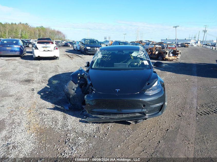 2022 Tesla Model 3 VIN: 5YJ3E1EC9NF103885 Lot: 11898887