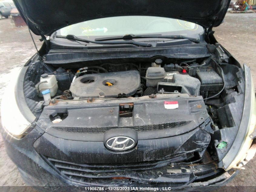 2014 Hyundai Tucson VIN: KM8JTCAFXEU933111 Lot: 11908784