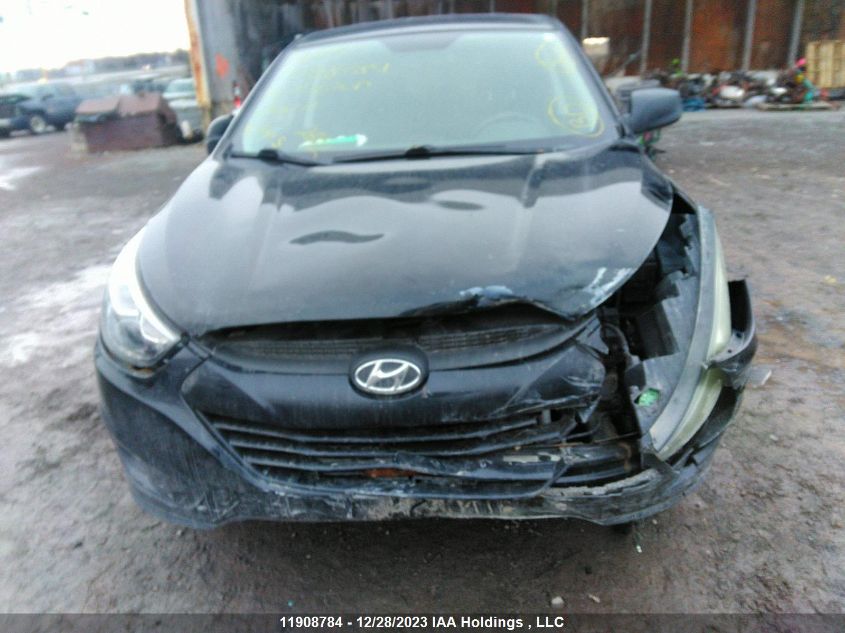 2014 Hyundai Tucson VIN: KM8JTCAFXEU933111 Lot: 11908784