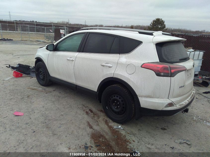 2T3RFREV0JW728008 2018 Toyota Rav4 Xle