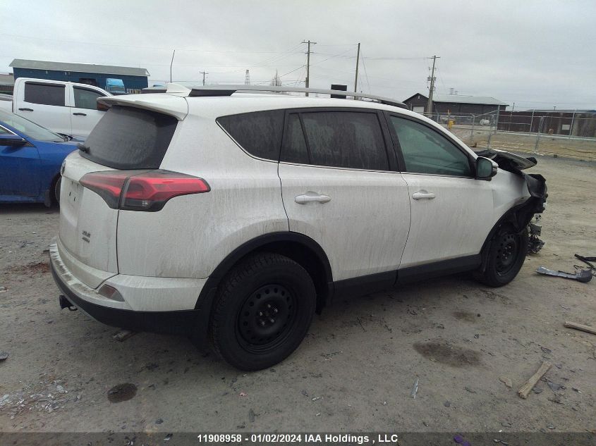 2T3RFREV0JW728008 2018 Toyota Rav4 Xle