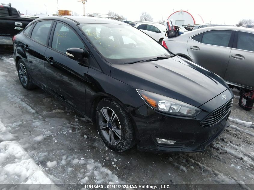 2018 Ford Focus Se VIN: 1FADP3FEXJL273633 Lot: 11918460