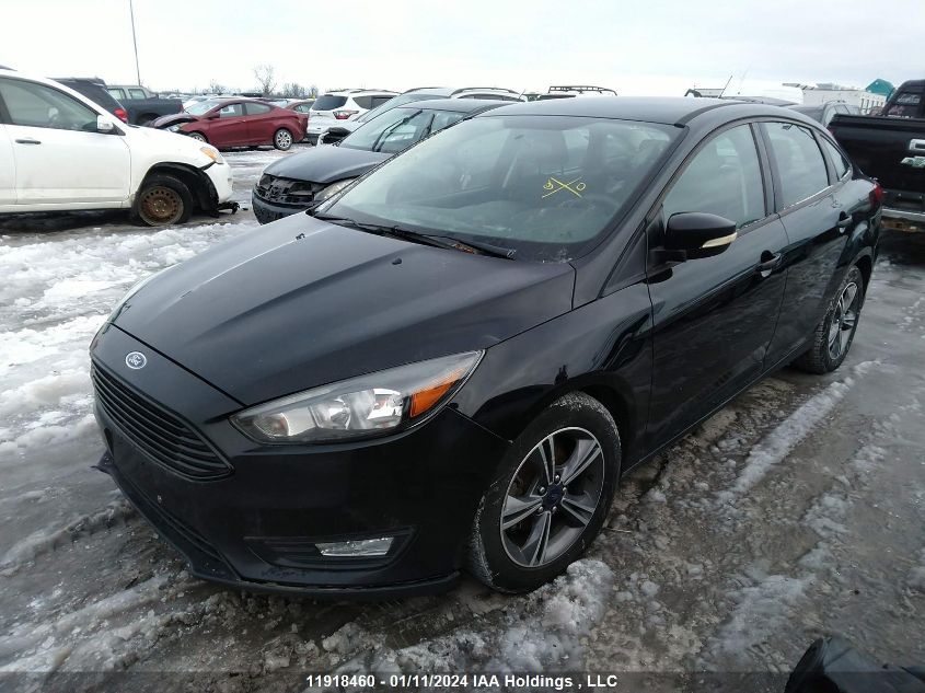 2018 Ford Focus Se VIN: 1FADP3FEXJL273633 Lot: 11918460