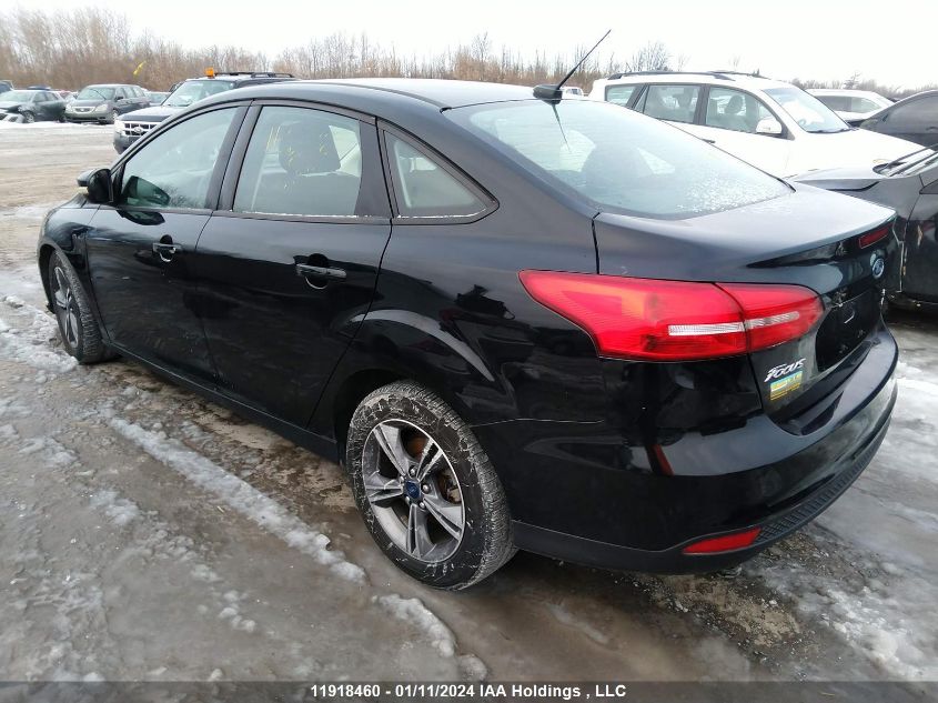 2018 Ford Focus Se VIN: 1FADP3FEXJL273633 Lot: 11918460