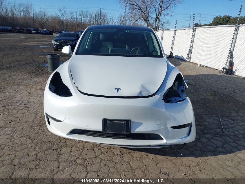 2021 Tesla Model Y VIN: 5YJYGAEE7MF303678 Lot: 11918998