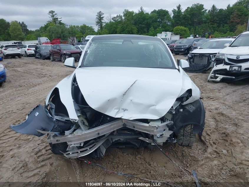 2023 Tesla Model Y VIN: LRWYGDEE0PC028994 Lot: 11934097