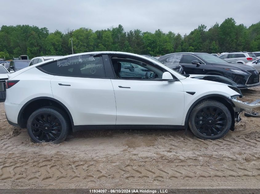 2023 Tesla Model Y VIN: LRWYGDEE0PC028994 Lot: 11934097