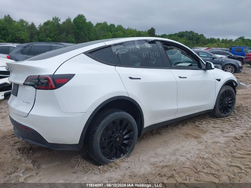 2023 Tesla Model Y VIN: LRWYGDEE0PC028994 Lot: 11934097