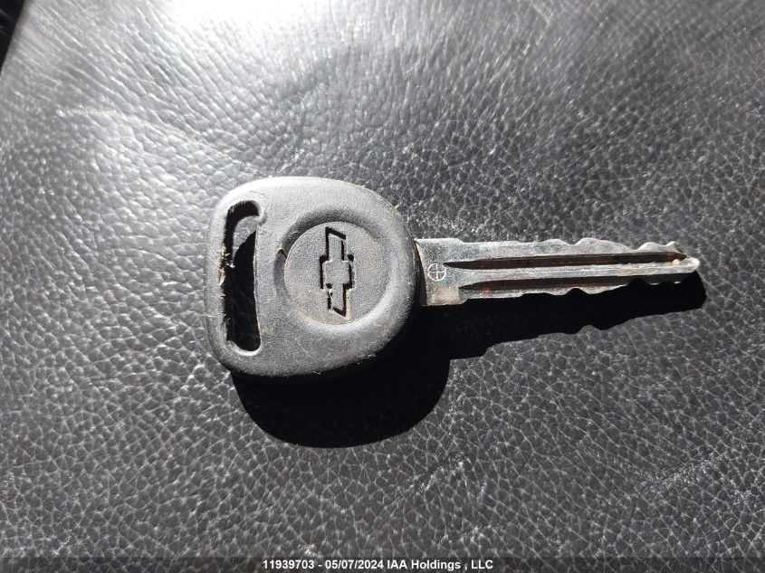 2012 Chevrolet Suburban VIN: 1GNSKJE74CR217833 Lot: 11939703