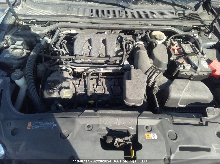 2014 Ford Taurus Police Interceptor VIN: 1FAHP2MK2EG104080 Lot: 11940737