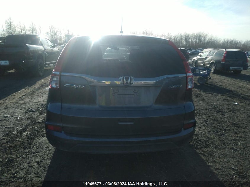 2015 Honda Cr-V Lx VIN: 2HKRM4H37FH110234 Lot: 11945677