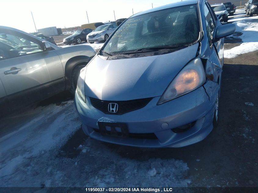 2009 Honda Fit VIN: JHMGE88839S803717 Lot: 11950037