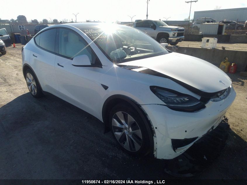 2021 Tesla Model Y VIN: 5YJYGAEE2MF300686 Lot: 11950674